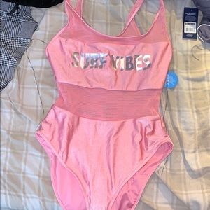 Cute pink never worn one piece
